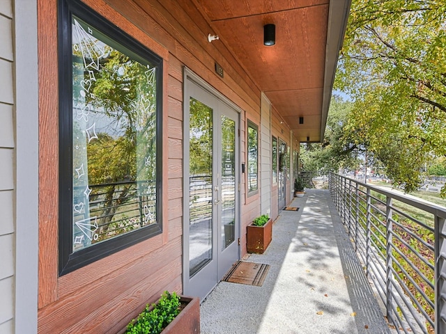 balcony featuring french doors