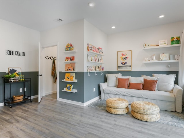 living area featuring wood-type flooring