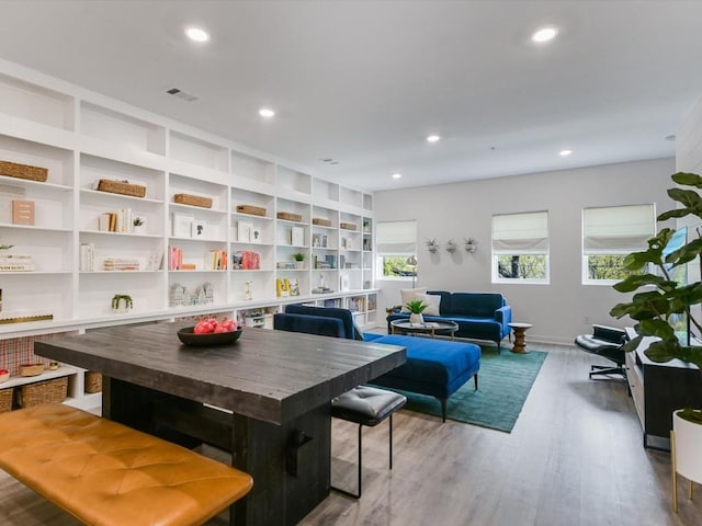 interior space with wood-type flooring and a wealth of natural light