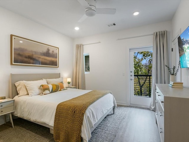 bedroom with access to exterior, ceiling fan, and light hardwood / wood-style floors