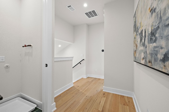 hallway featuring light hardwood / wood-style floors