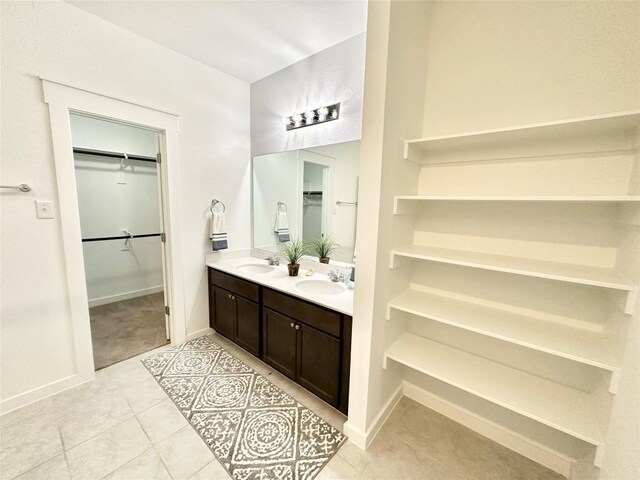 bathroom featuring vanity and tile patterned flooring