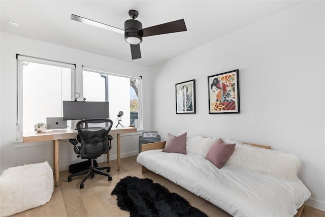 office area featuring ceiling fan and light wood-type flooring