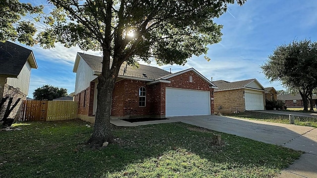 ranch-style home with a garage and a front yard