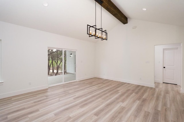 interior space featuring beam ceiling, light wood-type flooring, high vaulted ceiling, and an inviting chandelier