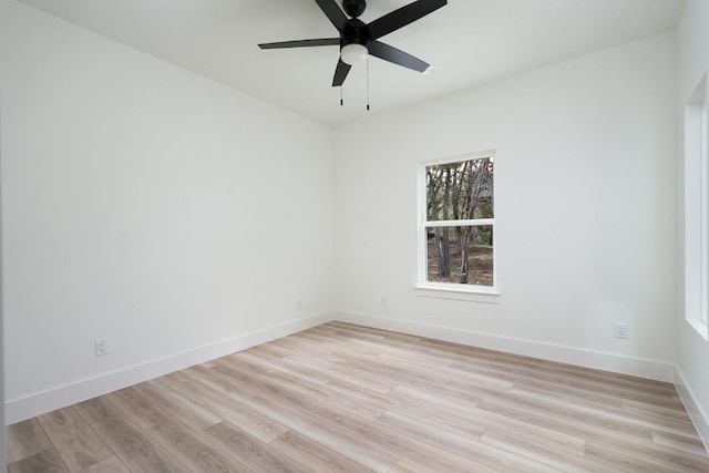 unfurnished room featuring ceiling fan and light hardwood / wood-style flooring