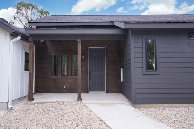 entrance to property with covered porch