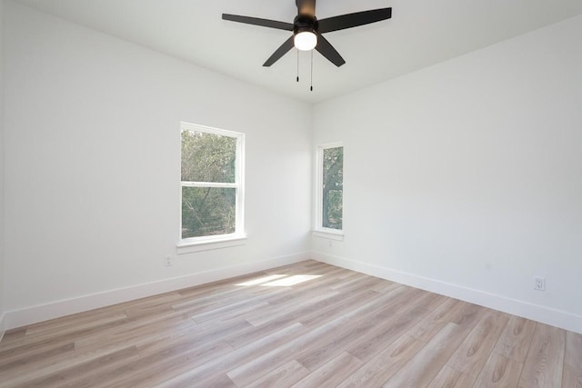 unfurnished room with ceiling fan and light hardwood / wood-style floors