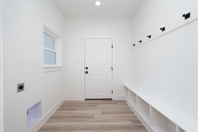 mudroom with light hardwood / wood-style floors