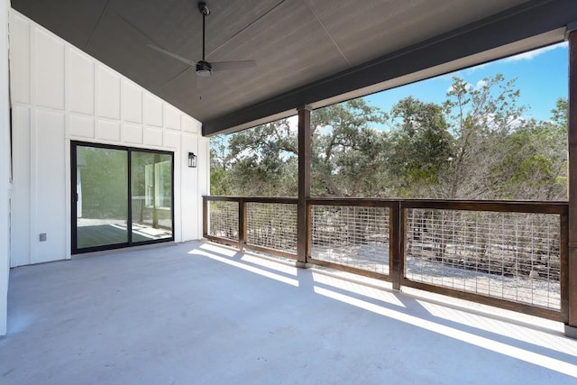 view of patio featuring ceiling fan