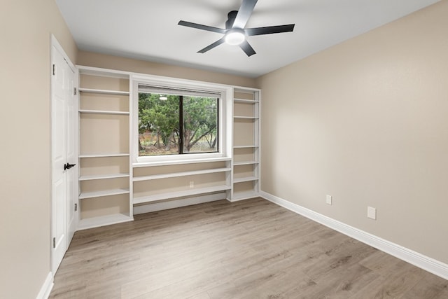 unfurnished bedroom with ceiling fan and light hardwood / wood-style floors