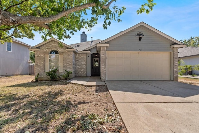 ranch-style house featuring a garage