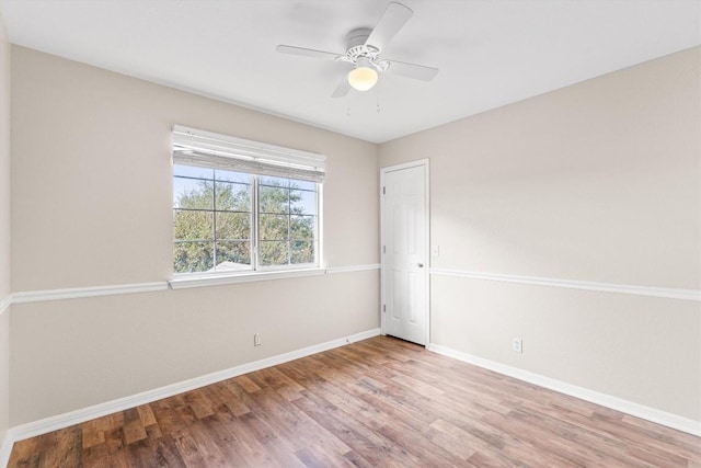 unfurnished room featuring ceiling fan and light hardwood / wood-style floors