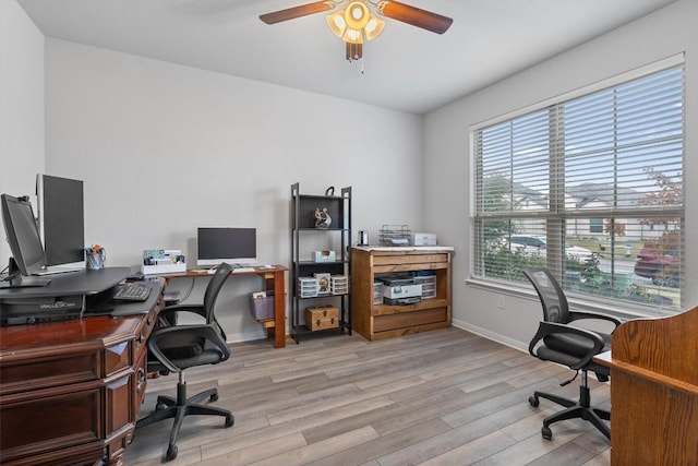 home office featuring ceiling fan and light wood-type flooring