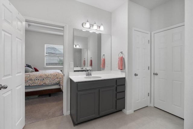 bathroom featuring tile patterned floors and vanity