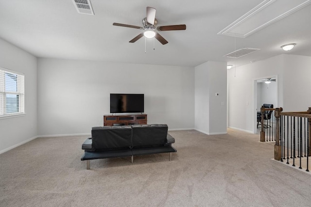 living room featuring light carpet and ceiling fan