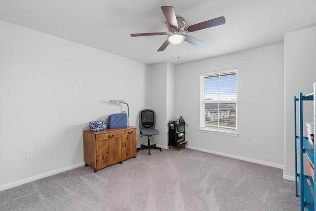 carpeted office with ceiling fan