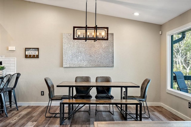 106 Center Cove Ii Loop, Spicewood, TX 78669 - dining space featuring wood finished floors, a chandelier, baseboards, lofted ceiling, and recessed lighting