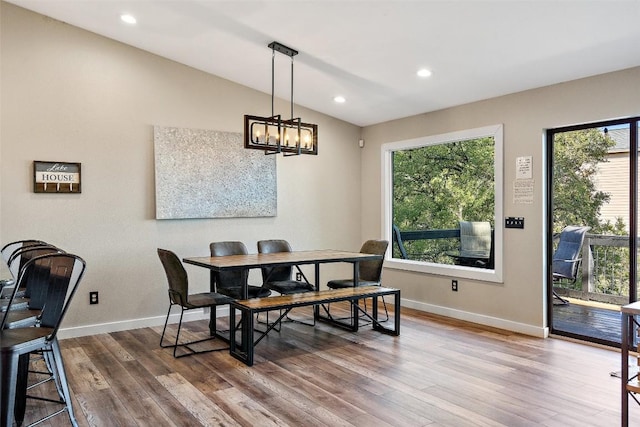 106 Center Cove Ii Loop, Spicewood, TX 78669 - dining space with plenty of natural light, dark wood-style floors, lofted ceiling, baseboards, and recessed lighting
