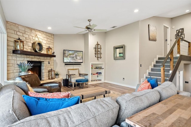 106 Center Cove Ii Loop, Spicewood, TX 78669 - living area featuring wood finished floors, a ceiling fan, stairway, baseboards, and recessed lighting