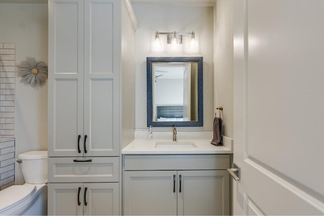 bathroom with vanity and toilet