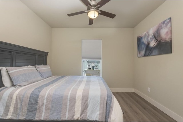 200 Archview Ln, Kingsland, TX 78639 - bedroom with dark wood-type flooring, baseboards, and a ceiling fan