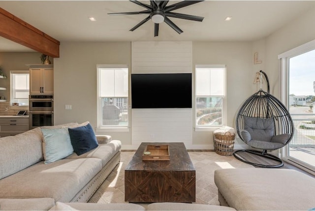 living room featuring ceiling fan