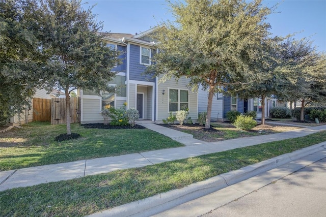 view of front facade with a front yard