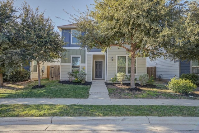 view of front of house with a front lawn