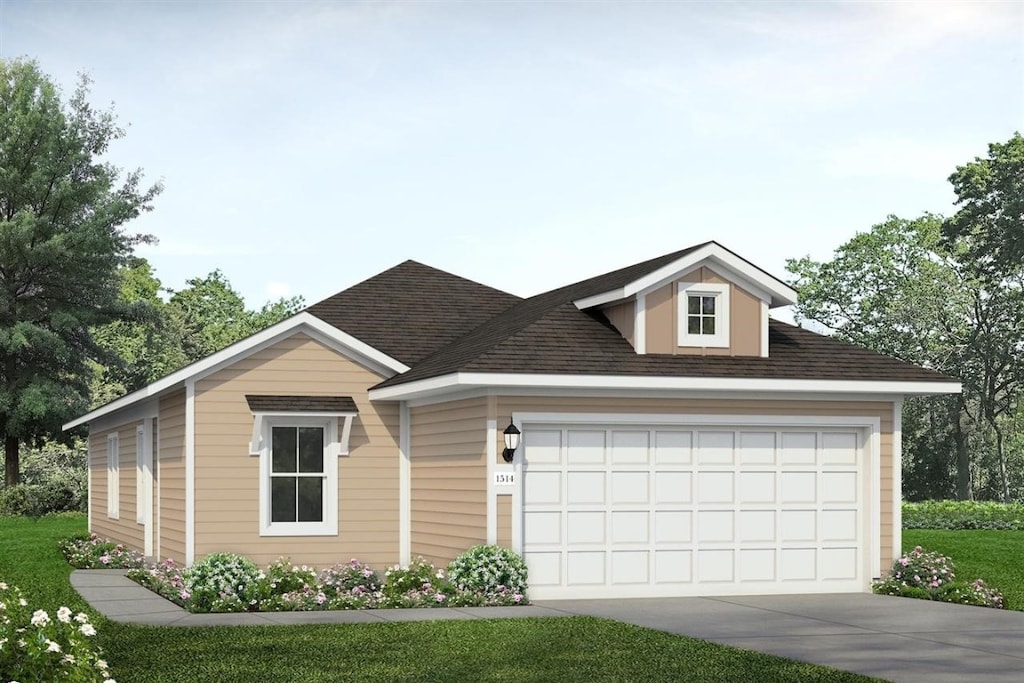 view of front of property featuring a garage and a front lawn