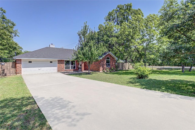 ranch-style house with a garage and a front lawn