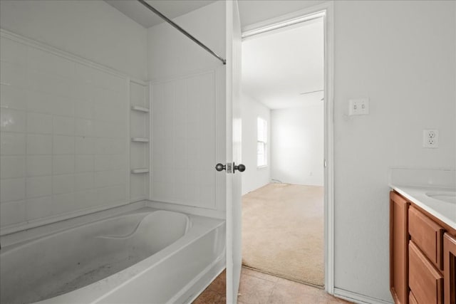 bathroom featuring vanity and tub / shower combination