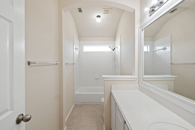 full bathroom with tile patterned floors, vanity, toilet, and tiled shower / bath