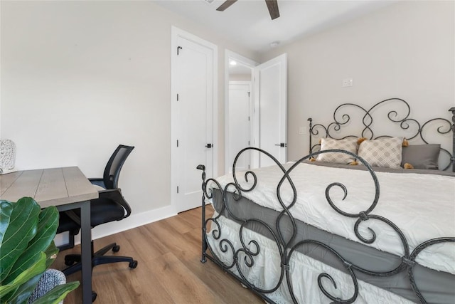 bedroom featuring ceiling fan and light hardwood / wood-style floors