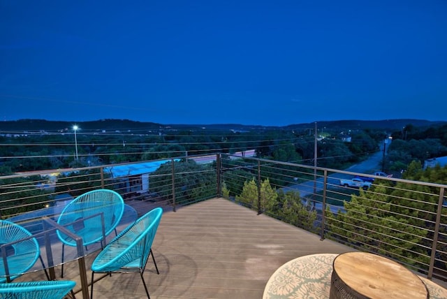 balcony featuring a mountain view