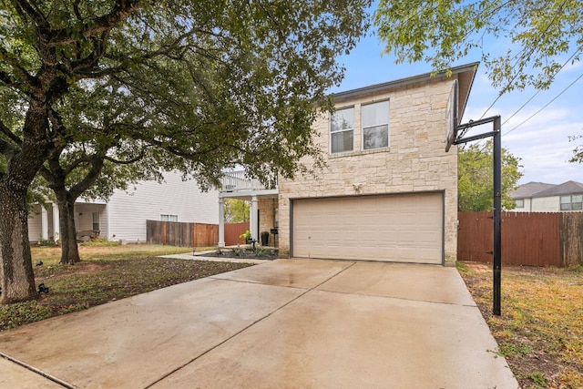 front of property with a garage