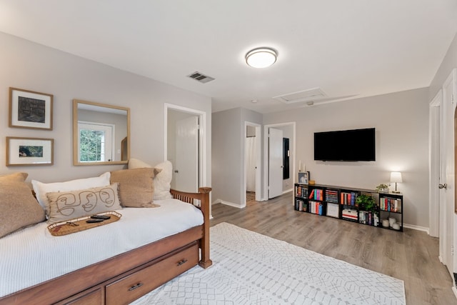 bedroom with light wood-type flooring