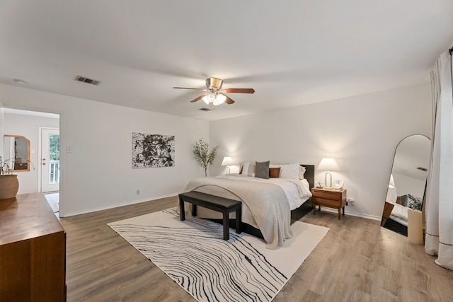 bedroom featuring ceiling fan and wood-type flooring