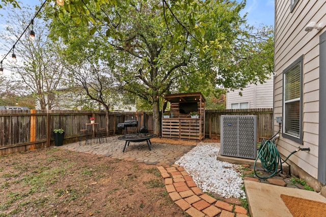 view of yard featuring a patio area and cooling unit