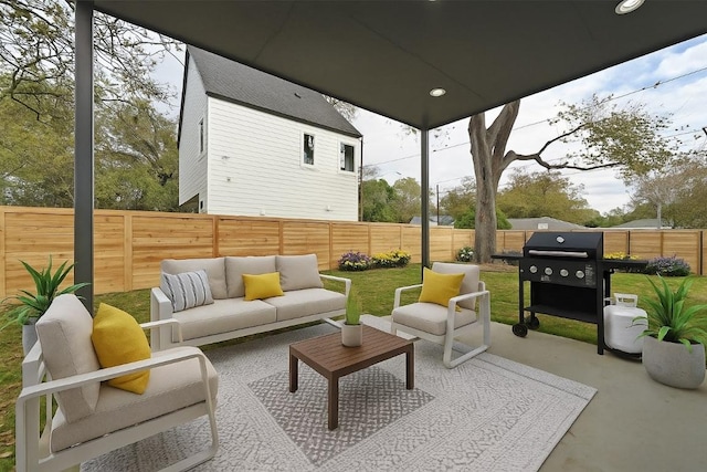 102 W Fawnridge Dr, Austin, TX 78753 - fenced backyard with grilling area, an outdoor living space, and a patio