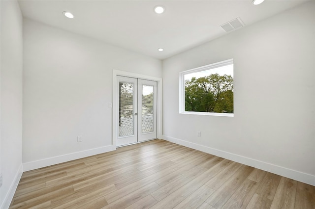102 W Fawnridge Dr, Austin, TX 78753 - empty room with light wood finished floors and recessed lighting