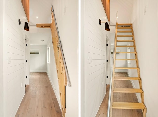 staircase featuring wood-type flooring