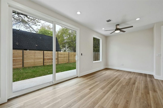 9104 Georgian Dr, Austin, TX 78753 - spare room with light wood finished floors, ceiling fan, and recessed lighting