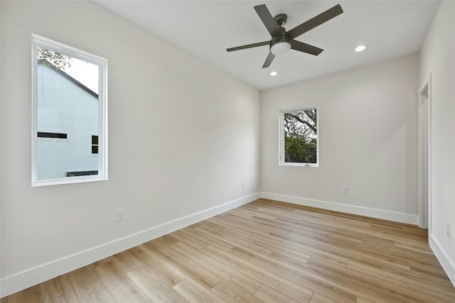 9104 Georgian Dr, Austin, TX 78753 - spare room with a ceiling fan, light wood-style floors, and recessed lighting