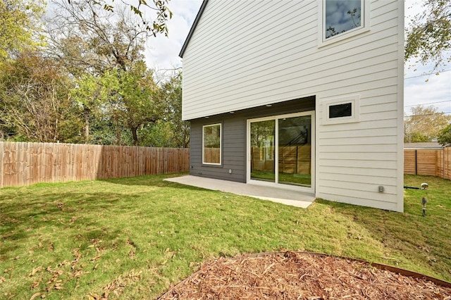 9104 Georgian Dr, Austin, TX 78753 - rear view of property with a fenced backyard and a patio area