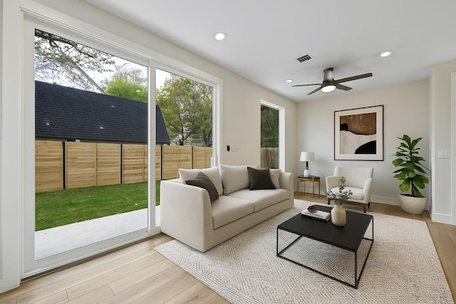 9104 Georgian Dr, Austin, TX 78753 - living area featuring light wood-style flooring, recessed lighting, and ceiling fan