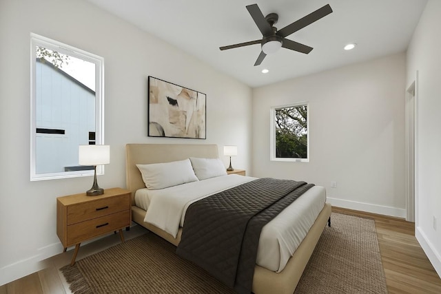 9104 Georgian Dr, Austin, TX 78753 - bedroom featuring wood finished floors, recessed lighting, and ceiling fan