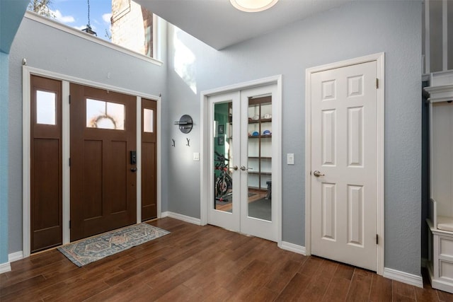 foyer with dark wood-type flooring