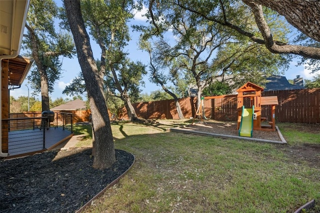 view of yard with a playground