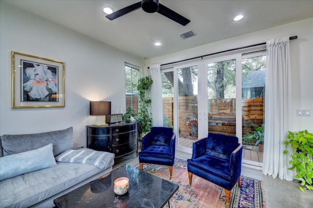 living room featuring ceiling fan